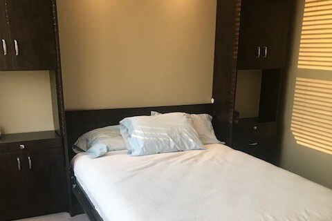 Murphy Bed down. - 450 W 7th St