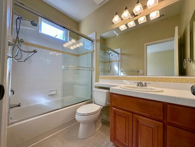 Building Photo - TOWNHOME WITH THOUGHTFUL UPGRADES | CALM SETTING