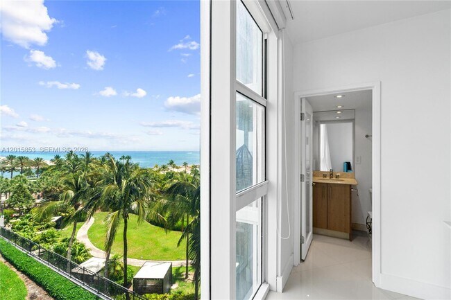 Building Photo - 10275 Collins Ave