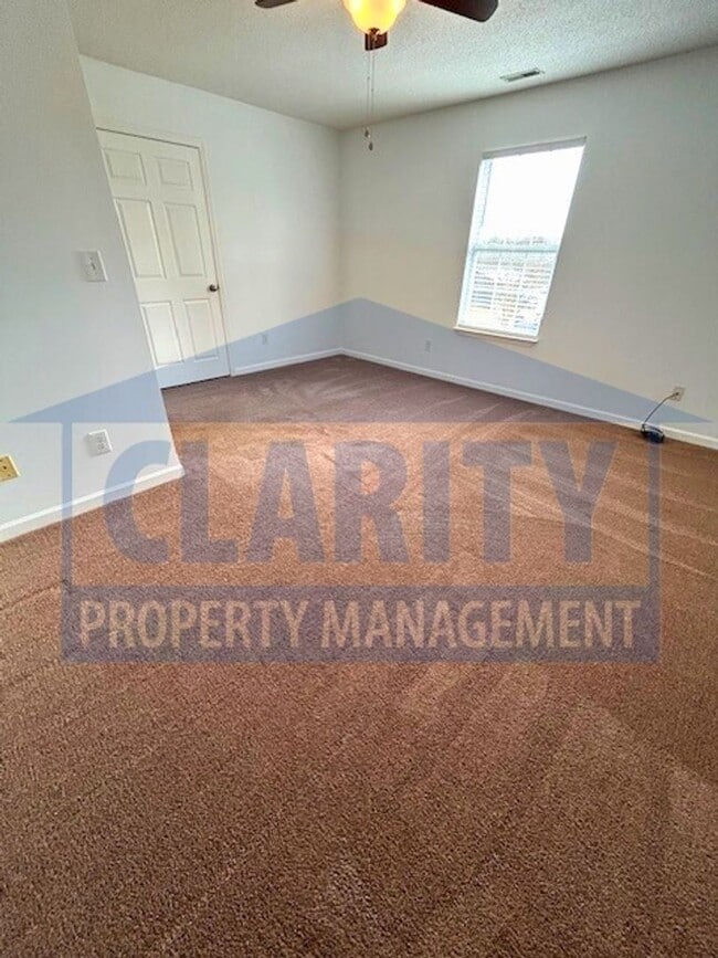 Building Photo - Three bedroom with attached garage!