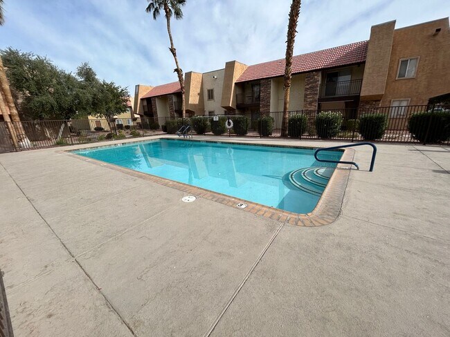 Building Photo - Stylish condo with new upgrades, tennis courts, and pool access