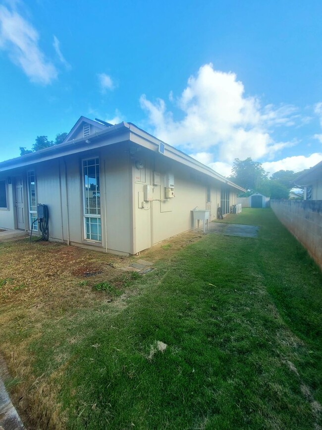 Building Photo - AVAILABLE | 4 Bedroom, 2 Bathroom Single L...