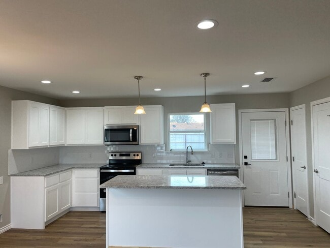 Building Photo - TLC CONDOS