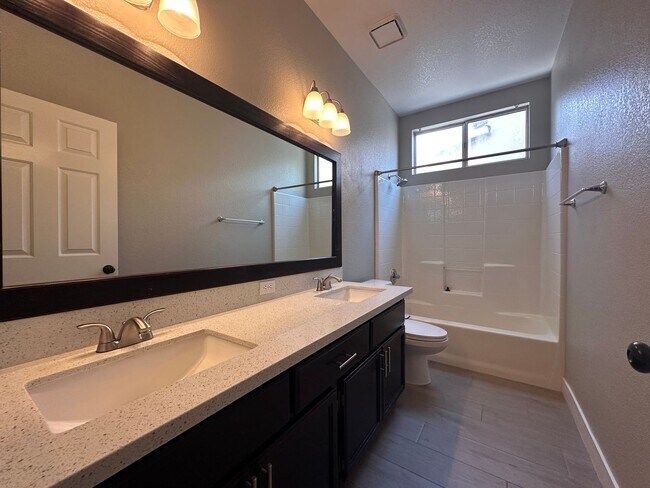 Building Photo - UPGRADED SINGLE STORY HOME WITH 4 BEDS, 2....