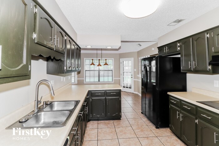 Building Photo - 7723 Ivy Mist Cove W