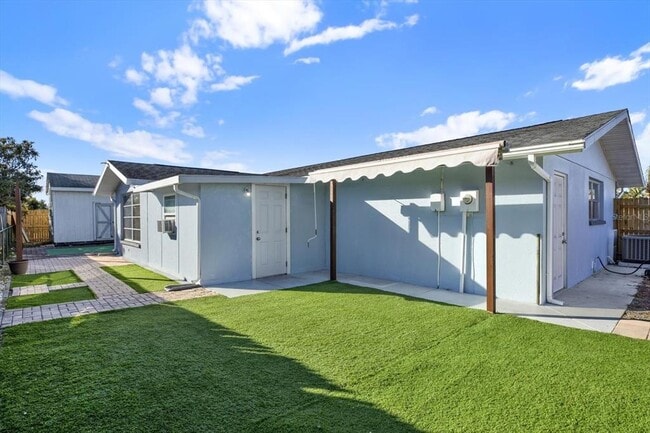 Building Photo - 7902 Canna Dr