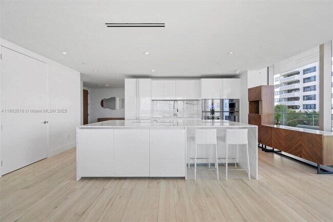 Building Photo - 10203 Collins Ave