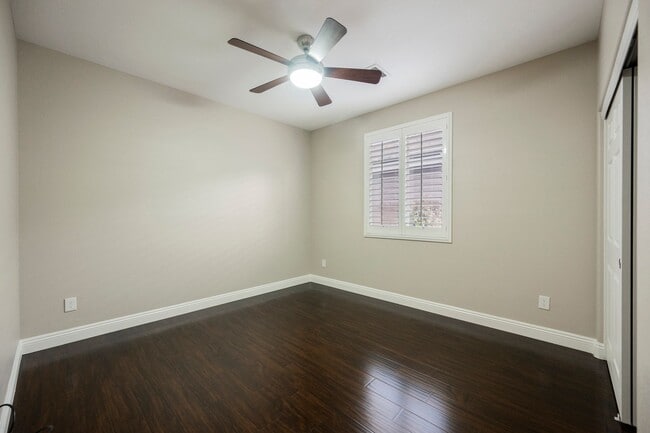 Building Photo - Single Story w/ duel primary suites gated ...