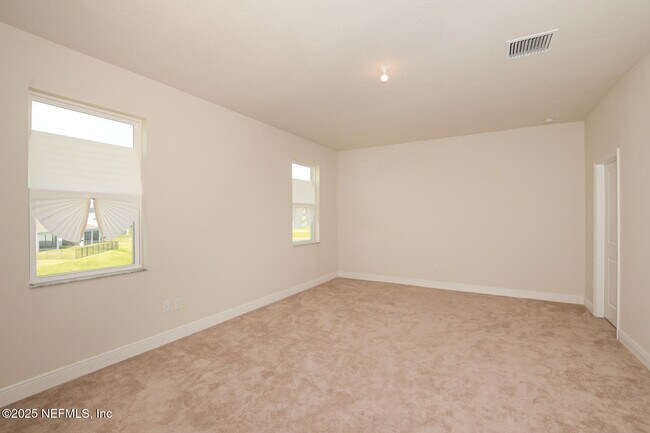Building Photo - 10976 SW Tessili Wy