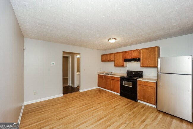 Building Photo - 6155 Forrest Ave