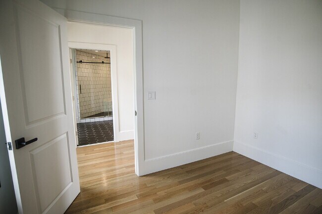 Building Photo - August Only: Submit your application this month and pay a reduced application fee of just $32. Ch...