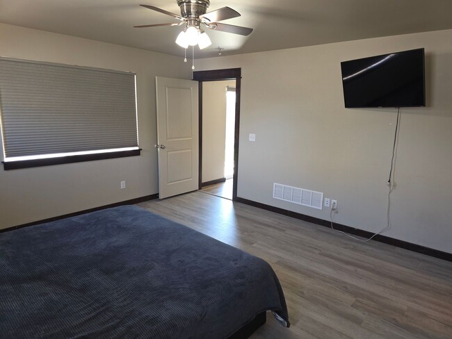 Building Photo - $500 OFF First Month's Rent! Spacious 3BR/2BA Home in Quiet Belgrade Neighborhood with Fenced Bac...