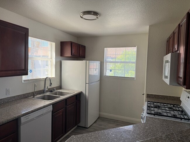 Building Photo - Beautiful 2-Bedroom Condo with Fireplace & Community Pool Near Cheyenne Freeway