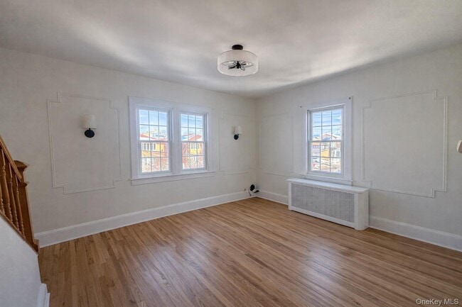 Building Photo - 214-06 36th Ave