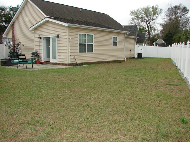 Back of houe/yard - 1028 Cherry Tree Ln