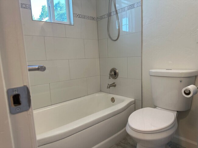 Building Photo - $1000 first month rent credit! Completely ...