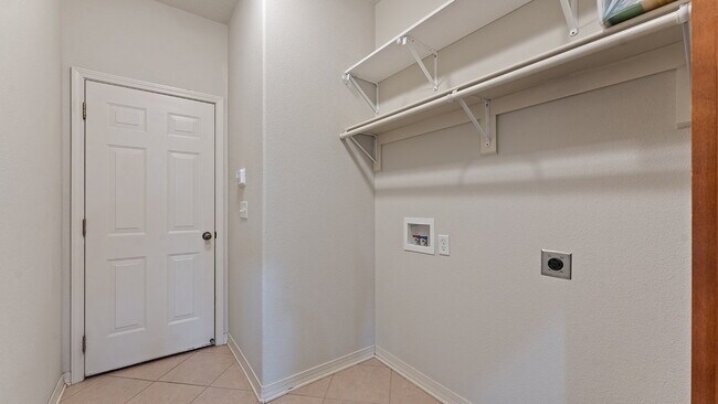 Building Photo - Charming 4-Bedroom Fayetteville Retreat with Granite Accents & Warm Fireplace!