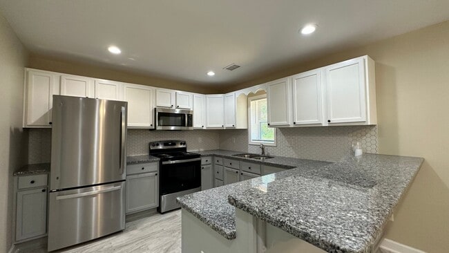 Building Photo - Charming Brand New 1 Bedroom 1 Bath Duplex