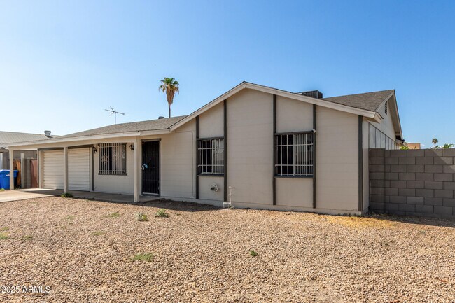Building Photo - 7926 West Campbell Ave