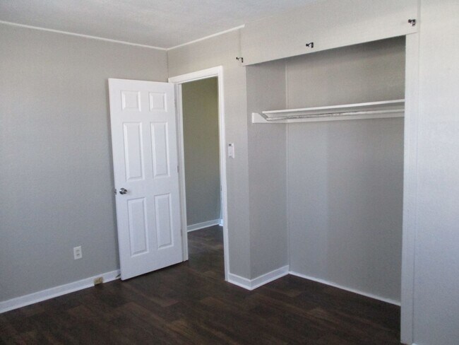 Building Photo - Charming two bedroom one bath duplex that is centrally located! Just minutes from area bases, sho...