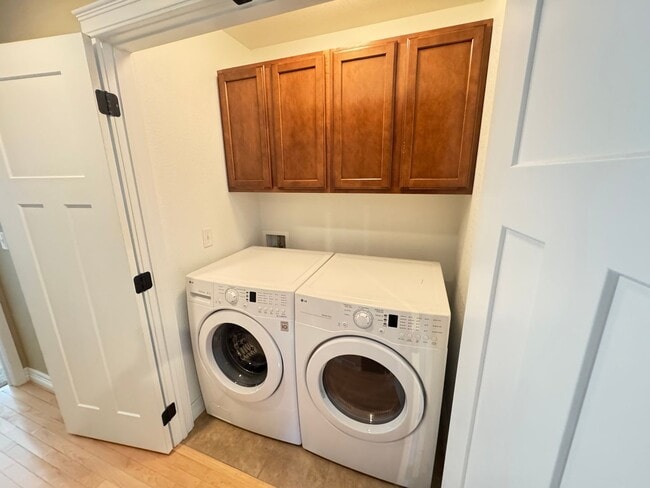 Building Photo - 4 BEDROOM, 3 BATHROOM TWINHOME WITH 2 CAR ATTACHED GARAGE IN NORTH CHEYENNE