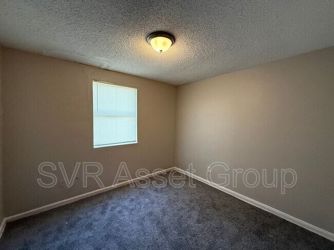 Building Photo - 9073 11th Ave