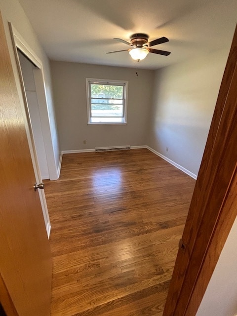 Bedroom 2 with freshly varnished hardwood floors - 409 Hill N Dale Cir