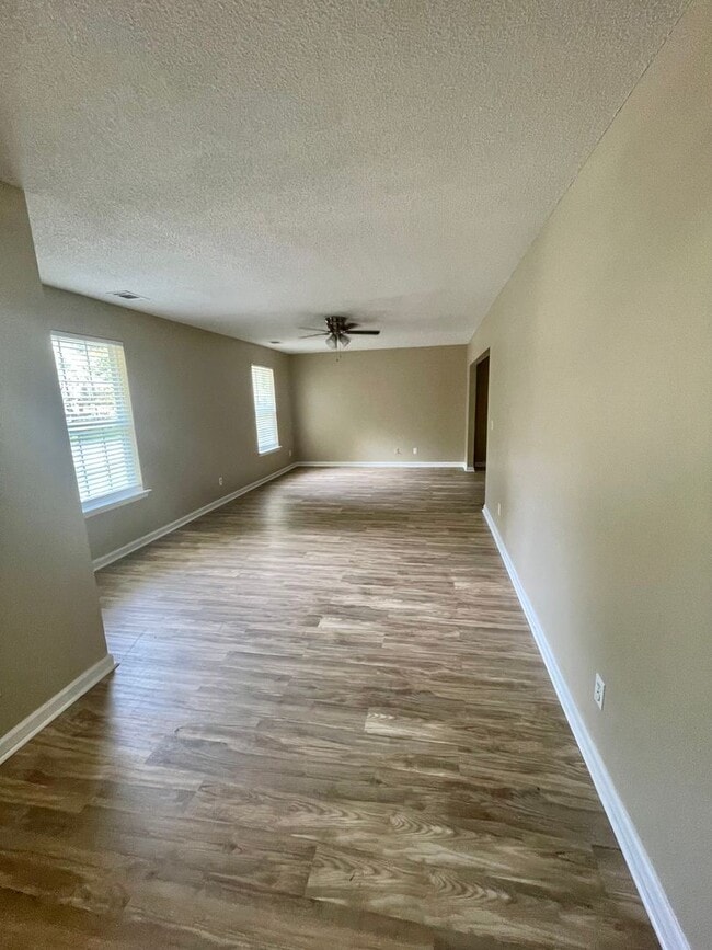 Building Photo - Spacious 4-Bedroom, 2-Bath Home with Fenced Backyard & Lawn Care Included