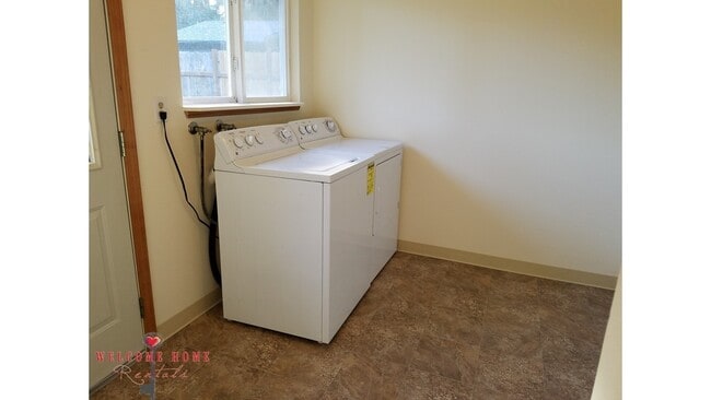 Building Photo - Beautiful Remodeled Rambler!!!  Come enjoy this HUGE backyard!!  NEW CARPET!!