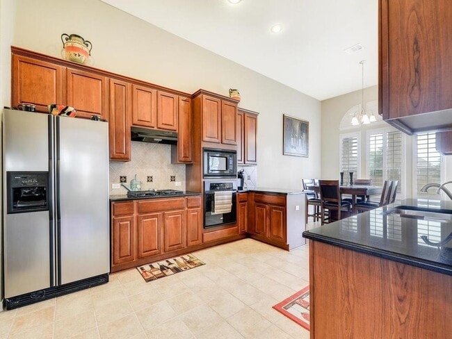 Building Photo - Beautiful one story stone home in Estates at Settlers Park