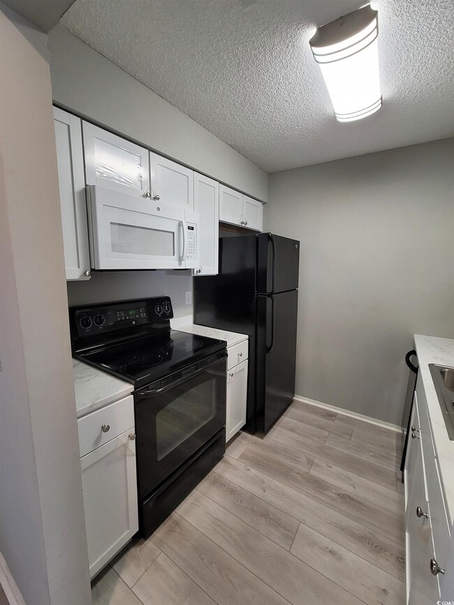 Building Photo - 4493 Little River Inn Ln