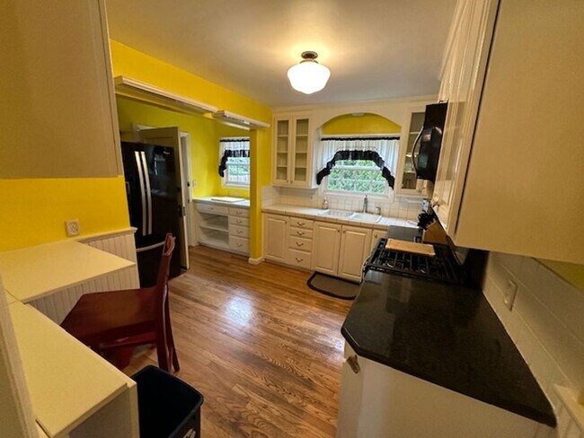 Building Photo - Furnished Story Book Home near Campus with...