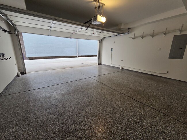 Building Photo - STUNNING 4-LEVEL TOWNHOME IN HIGHLANDS WITH SAUNA, 2-CAR GARAGE + AMAZING ROOFTOP DECK!