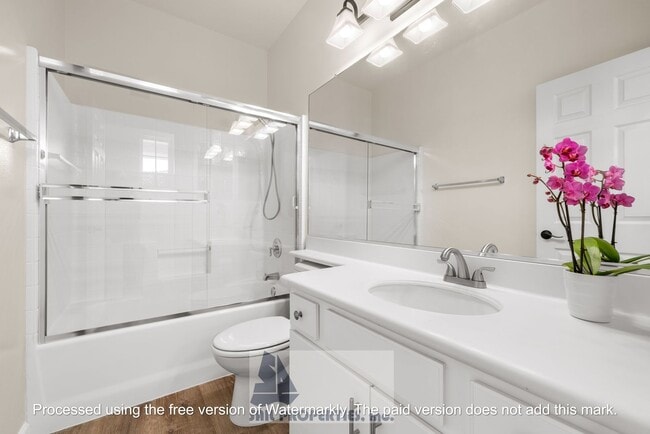 Building Photo - Welcome to this stunning 2-bedroom condo in gated community