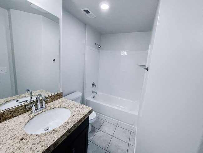 Building Photo - Brand New Idyllic Townhome in AF