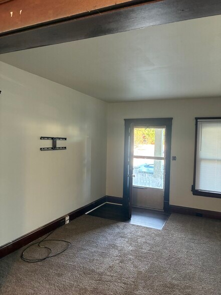 Front entrance, new flooring and carpet, and paint, wood trim - 18243 Sloane Ave