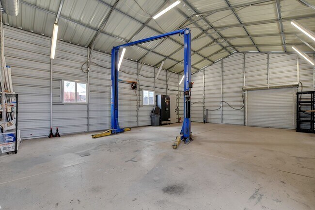 Building Photo - UNIQUE SINGLE FAMILY HOME! - No HOA, Car Lift, RV Parking and Nice Backyard