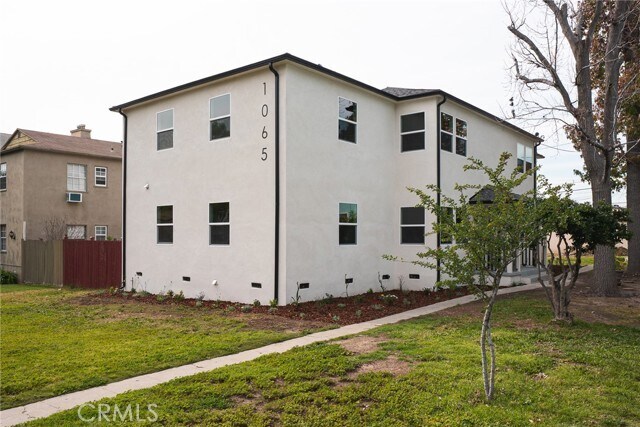 Building Photo - 1065 E Spazier Ave