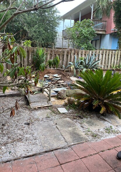 lush vegetation and 2 patio areas - A work in progress! - 110 B St