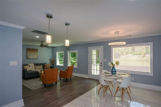 Building Photo - Modern 2BR/2BA Apartment with Private Deck...