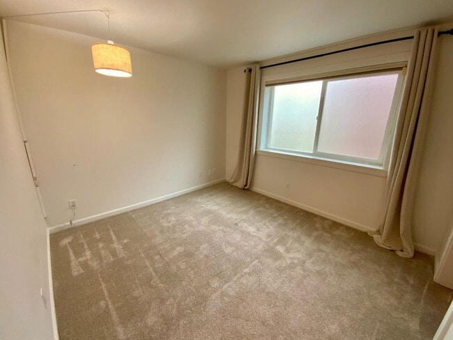 Building Photo - 1,300+ Sq Ft 2BR Condo w/ Parking, W/D & Utilities Included | $1,000 Move-In Credit