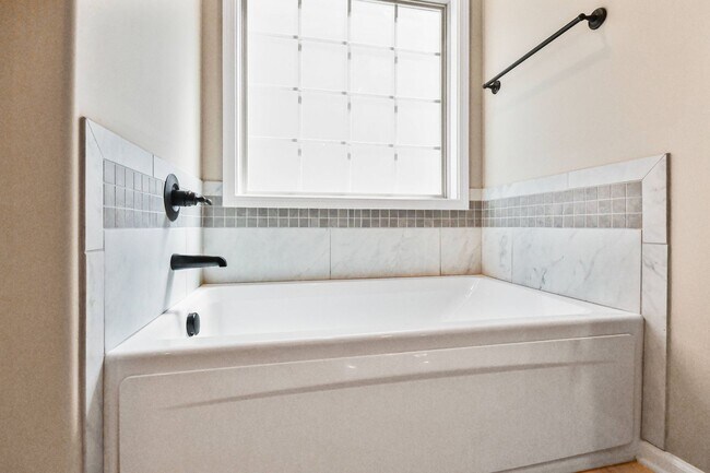 Building Photo - Pet Friendly Three Bedroom with Bonus!