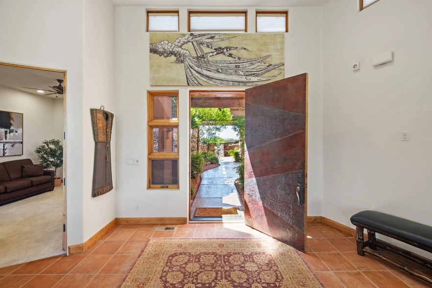 Gallery-Style Foyer With Oversized Pivot Door - 1500 E Split Rock Dr
