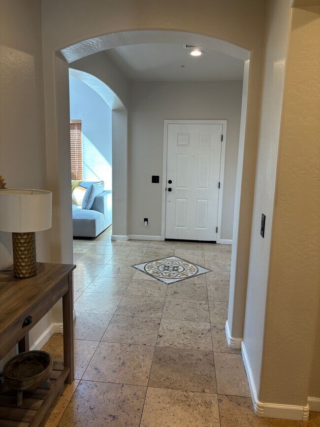 Building Photo - Furnished, 1-Year Long-Term Rental