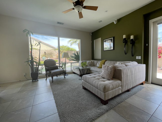 Spacious Family Room with View of Pool Through Large Windows - 18 Vista Mirage Way