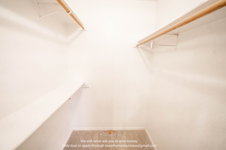 Walk in closet for bedroom 2 - 1811 San Rafael St