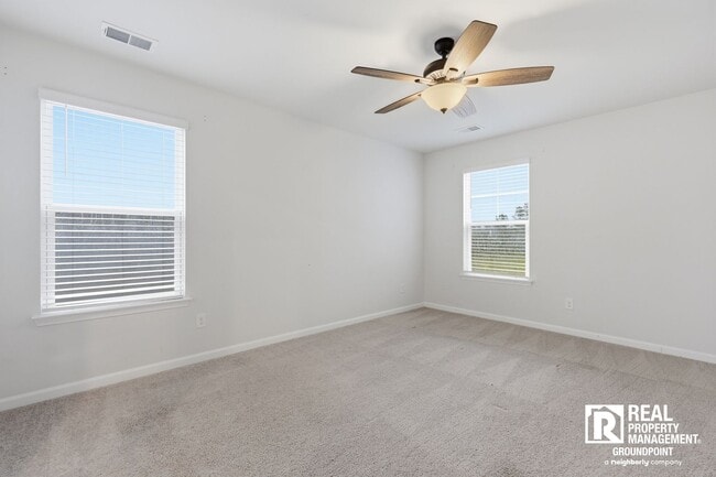 Building Photo - 4 Bedroom Rental in Cane Bay Plantation with Open Layout and Pond View