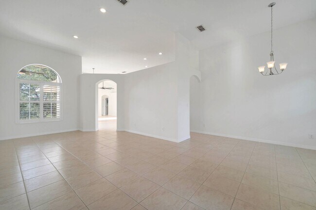 Building Photo - Stunning 4/3 with Fence Enclosed Yard in t...