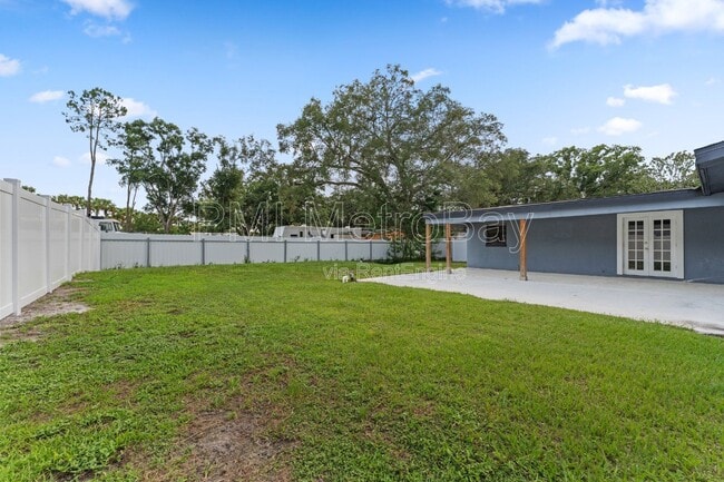 Building Photo - 6121 N Falkenburg Rd
