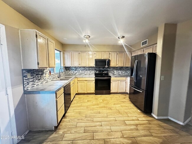 Building Photo - 1836 N Stapley Dr